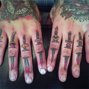 Tatouage couteau doigt